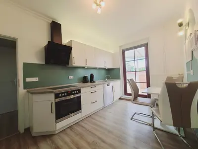 Küche/Küchenzeile in der Unterkunft Neu! Spreelounge Apartments! Ihre Auszeit im Herzen des Spreewalds