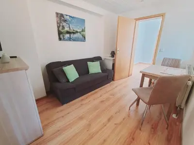 Ein Sitzbereich in der Unterkunft Neu! Spreelounge Apartments! Ihre Auszeit im Herzen des Spreewalds