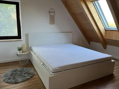 Ein Bett oder Betten in einem Zimmer der Unterkunft Brandenburg Oase