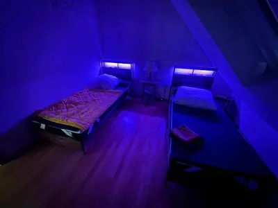 Ein Bett oder Betten in einem Zimmer der Unterkunft Bärenheim