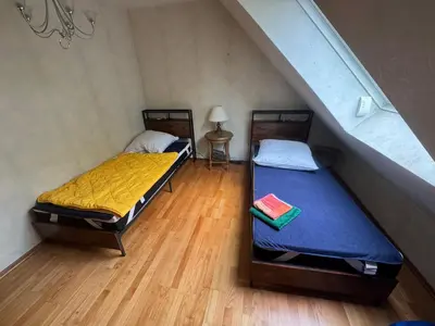 Ein Bett oder Betten in einem Zimmer der Unterkunft Bärenheim