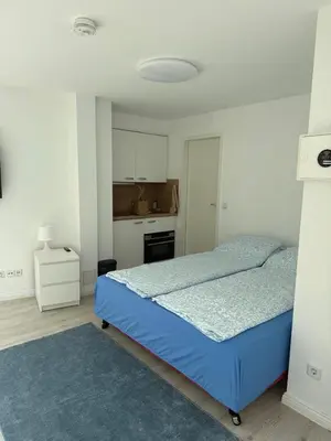 Ein Bett oder Betten in einem Zimmer der Unterkunft Gesundbrunnen-2