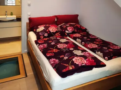 Ein Bett oder Betten in einem Zimmer der Unterkunft Seeapartment Wustrau