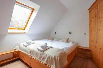 Ein Bett oder Betten in einem Zimmer der Unterkunft Mozart
