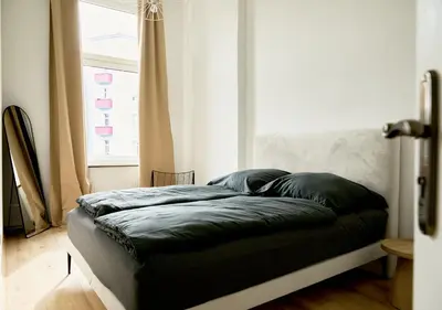 Ein Bett oder Betten in einem Zimmer der Unterkunft Design Apartment Berlin Mitte