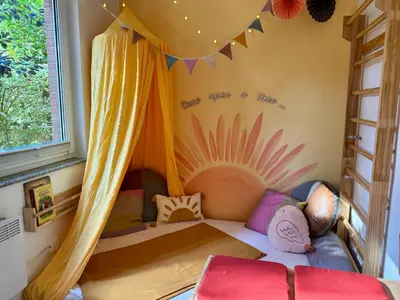 Ein Bett oder Betten in einem Zimmer der Unterkunft FamilienNest XXL - direkt am See