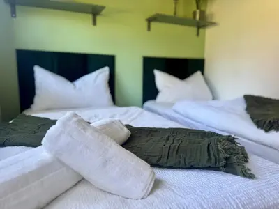 Ein Bett oder Betten in einem Zimmer der Unterkunft FamilienNest XXL - direkt am See