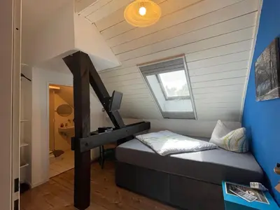 Ein Bett oder Betten in einem Zimmer der Unterkunft Gasthaus Bellevue