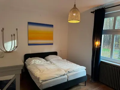 Ein Bett oder Betten in einem Zimmer der Unterkunft Country house villa near Berlin