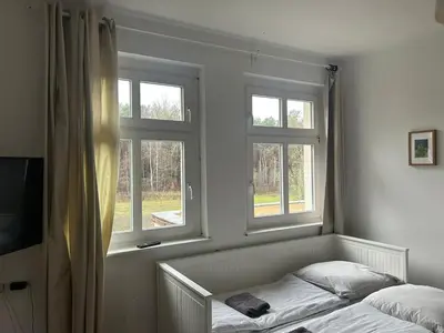 Ein Bett oder Betten in einem Zimmer der Unterkunft Country house villa near Berlin