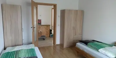 Ein Bett oder Betten in einem Zimmer der Unterkunft Ferienwohnung,Monteurwohnung Spreenhagen bei Berlin
