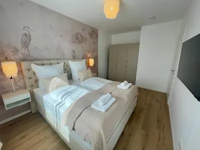 Ein Bett oder Betten in einem Zimmer der Unterkunft Komm & Bleib Nähe Berlin mit Parkplatz