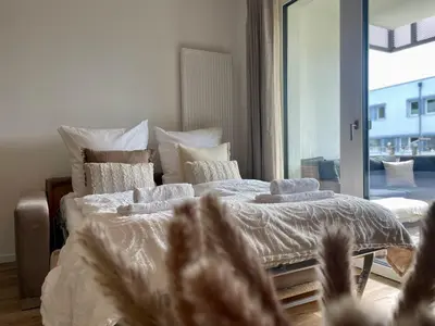 Ein Bett oder Betten in einem Zimmer der Unterkunft Komm & Bleib Nähe Berlin mit Parkplatz