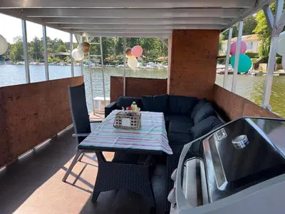 Ein Sitzbereich in der Unterkunft Party Grill Boot