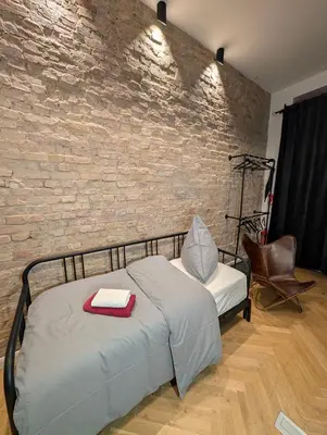 Ein Bett oder Betten in einem Zimmer der Unterkunft K&S Apartments