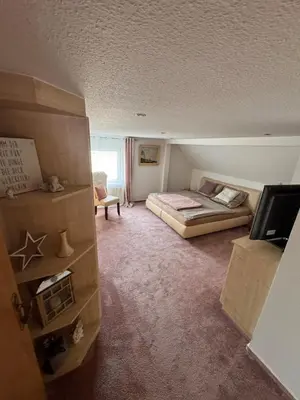 Ein Bett oder Betten in einem Zimmer der Unterkunft Fischerhaus Ketzin