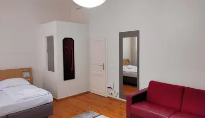 Ein Bett oder Betten in einem Zimmer der Unterkunft M101 Rooms