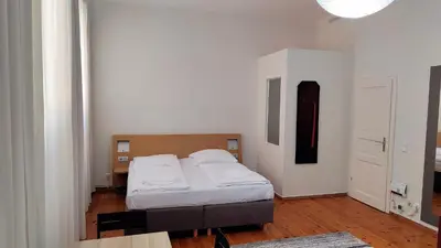 Ein Bett oder Betten in einem Zimmer der Unterkunft M101 Rooms
