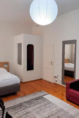 Ein Bett oder Betten in einem Zimmer der Unterkunft M101 Rooms