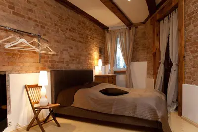 Ein Bett oder Betten in einem Zimmer der Unterkunft Smart Appart Blücher Berlin