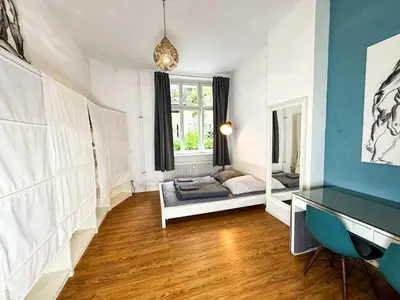 Ein Bett oder Betten in einem Zimmer der Unterkunft Schoenes Apartment in Prenzlauer Berg x Winskiez