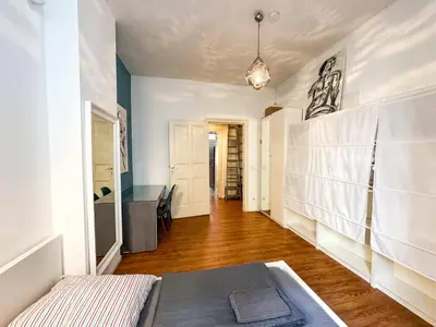 Ein Bett oder Betten in einem Zimmer der Unterkunft Schoenes Apartment in Prenzlauer Berg x Winskiez