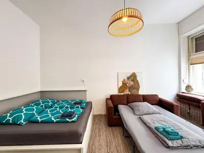 Ein Bett oder Betten in einem Zimmer der Unterkunft Schoenes Apartment in Prenzlauer Berg x Winskiez