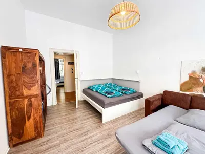Ein Bett oder Betten in einem Zimmer der Unterkunft Schoenes Apartment in Prenzlauer Berg x Winskiez