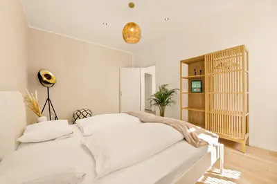 Ein Bett oder Betten in einem Zimmer der Unterkunft Kreuzberg - Fürbringerstraße Kiez Apartment