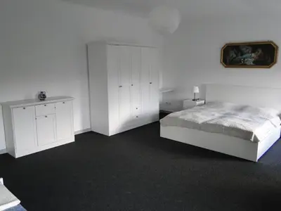 Ein Bett oder Betten in einem Zimmer der Unterkunft Ferienwohnung Sonnenaufgang im Ruppiner Land