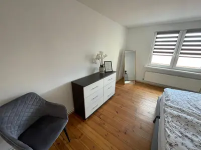 Ein Bett oder Betten in einem Zimmer der Unterkunft Trebelsee 2 Monteur- und Ferienwohnung