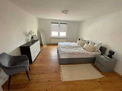 Ein Bett oder Betten in einem Zimmer der Unterkunft Trebelsee 2 Monteur- und Ferienwohnung