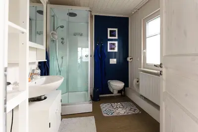 Ein Badezimmer in der Unterkunft Hyggely Marie Sophie