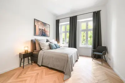 Ein Bett oder Betten in einem Zimmer der Unterkunft The Bornholmer, Spacious 100m2, Ideal for Groups & Families, 2BR, huge living room, 4 - 8 Guests