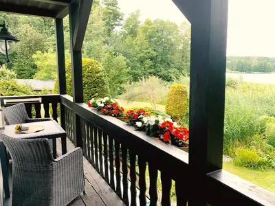 Ein Balkon oder eine Terrasse in der Unterkunft Chalet am See Sader