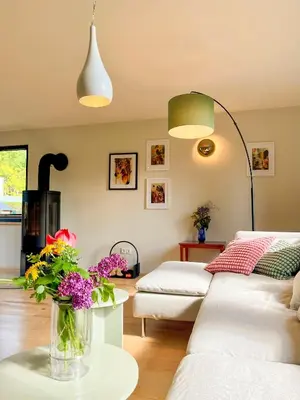 Ein Sitzbereich in der Unterkunft Haus 1 am Grimnitzsee - erstklassiges Design, mit eigenem Garten und nah am See