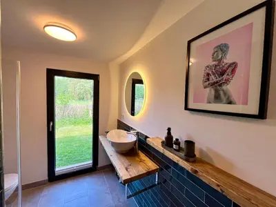 Ein Badezimmer in der Unterkunft Haus 1 am Grimnitzsee - erstklassiges Design, mit eigenem Garten und nah am See
