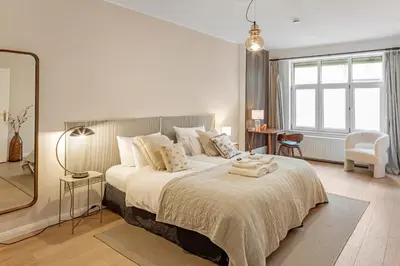 Ein Bett oder Betten in einem Zimmer der Unterkunft Large and Central Boutique 5-Bedroom Berlin Apartment
