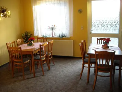 Ein Sitzbereich in der Unterkunft Ferienzimmer in Pension zur alten Weide im Oderbruch
