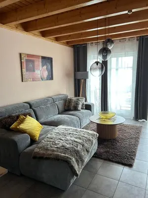 Ein Sitzbereich in der Unterkunft Ferienhaus Leuchtturmblick Hafendorf Rheinsberg