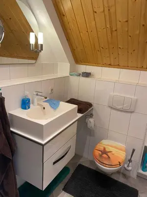 Ein Badezimmer in der Unterkunft Ferienhaus Leuchtturmblick Hafendorf Rheinsberg