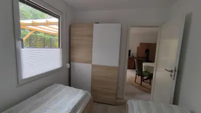 Ein Bett oder Betten in einem Zimmer der Unterkunft Kleines Haus am Wald