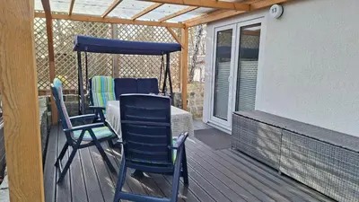 Ein Balkon oder eine Terrasse in der Unterkunft Kleines Haus am Wald