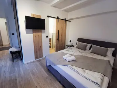 Ein Bett oder Betten in einem Zimmer der Unterkunft Pension Zum Stellmacher