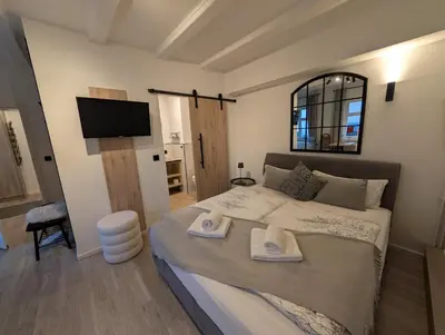 Ein Bett oder Betten in einem Zimmer der Unterkunft Pension Zum Stellmacher