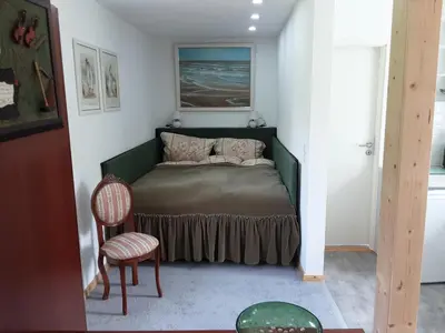 Ein Bett oder Betten in einem Zimmer der Unterkunft Gästehaus im Grünen