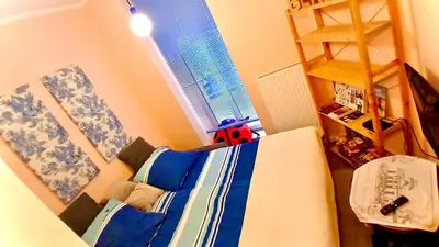 Ein Bett oder Betten in einem Zimmer der Unterkunft Prenzlauer Berg, Cozy Ground Floor Apartment