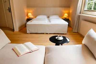 Ein Bett oder Betten in einem Zimmer der Unterkunft Seehotel Köllnitz