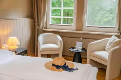 Ein Bett oder Betten in einem Zimmer der Unterkunft Seehotel Köllnitz