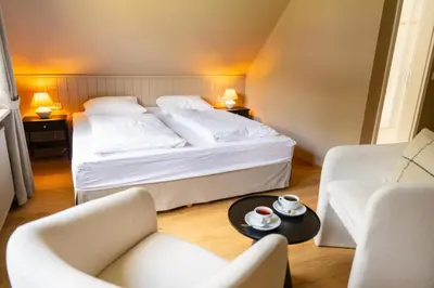 Ein Bett oder Betten in einem Zimmer der Unterkunft Seehotel Köllnitz